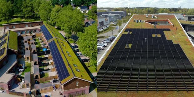 Aerial view of solar panels on two rooftops: a residential complex on the left and a large flat-roof building on the right.